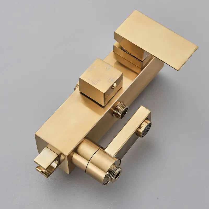 Colonne de douche dorée pluie