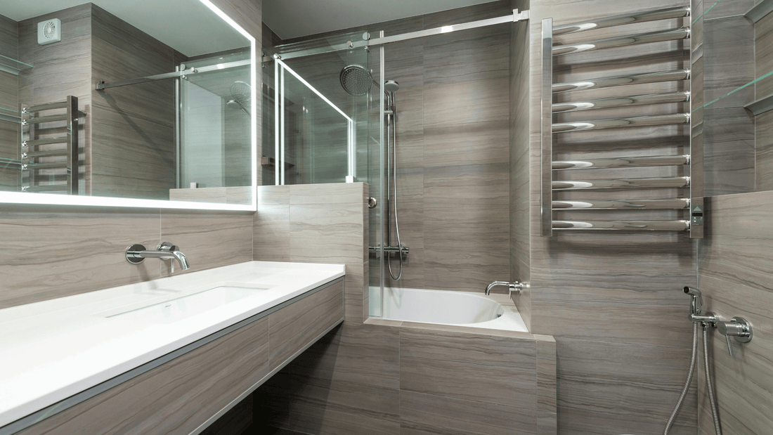 Comment fixer une colonne de douche sans percer de trous ?