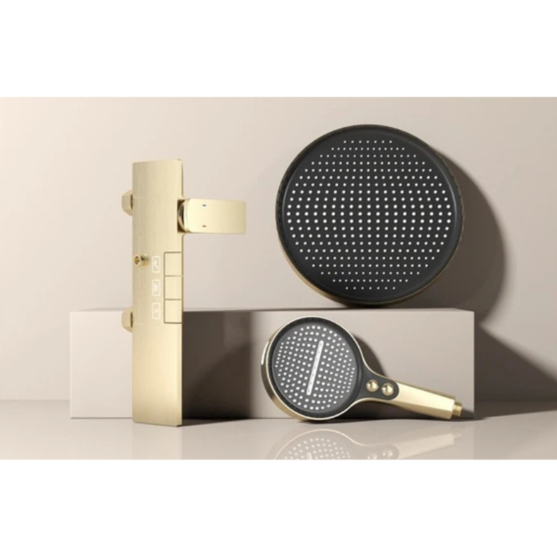 Colonne de douche dorée avec tablette