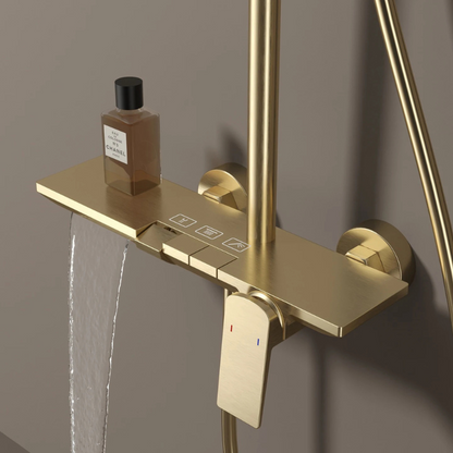 Colonne de douche dorée avec tablette